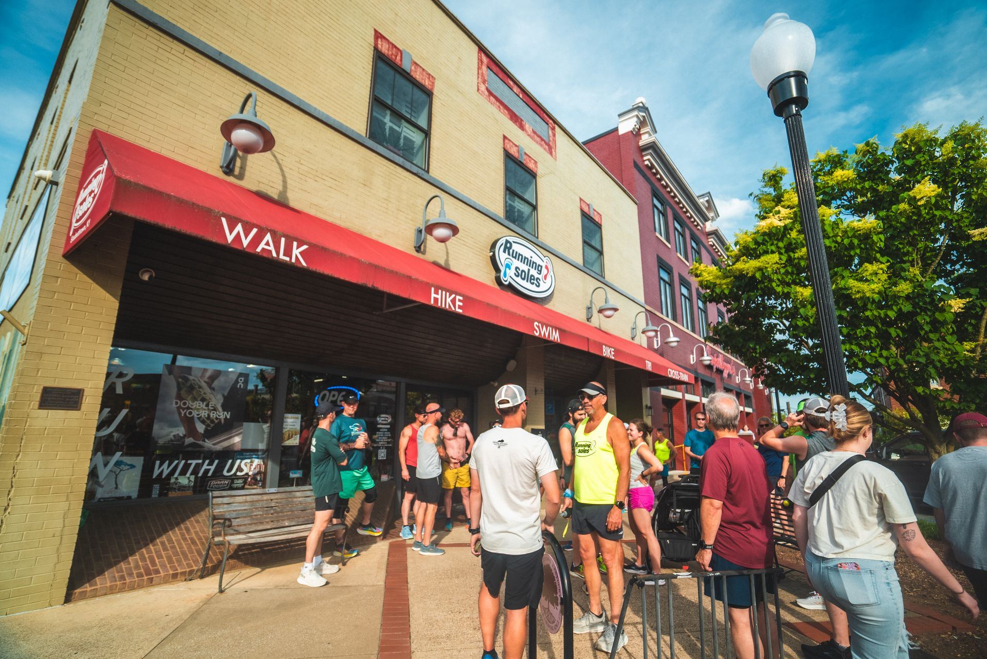 Runners gathering outside the Running Soles store in downtown Elizabethtown
